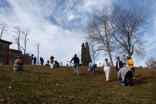 Volunteers from ASU worked with the Junaluska Heritage Association to place grave markers on unmarked graves in the Old Boone Cemetery