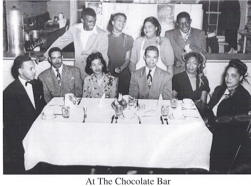 A Group Gathered at The Chocolate Bar